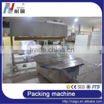 China Foshan NaiGu mattress film packing machinery production line