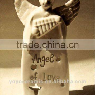 white ceramic angel of love for wedding gifts