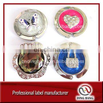 OEM Wholesale Stock Items Various Design Client's Printed /Casted Logo Accepted Fashional Souvenir Custom Bag Hanger