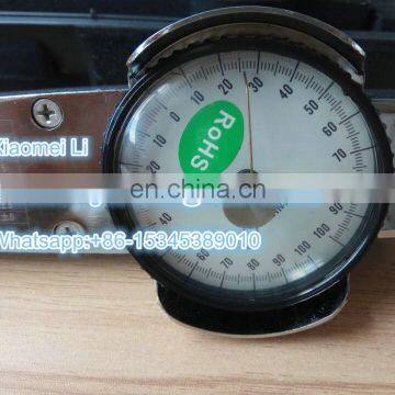 Torque wrench with torque gauge