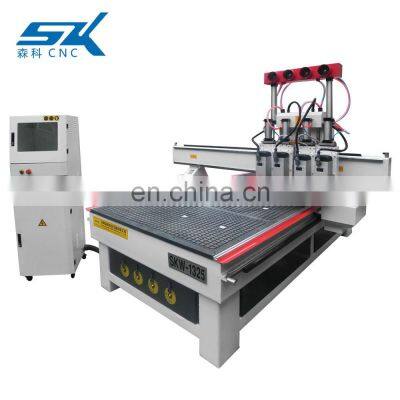 Wood CNC Router With Pneumatic Cylinders 4 Spindles Pneumatic Tool Changing ATC Woodworking Machine photo-4