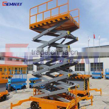 Trailing manual mobile scissor hydraulic lifter for sale