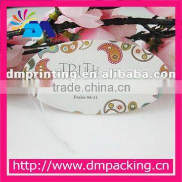 Oval shape paper jewelry tag with rope