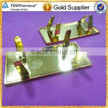 Metal logo mark for handbags