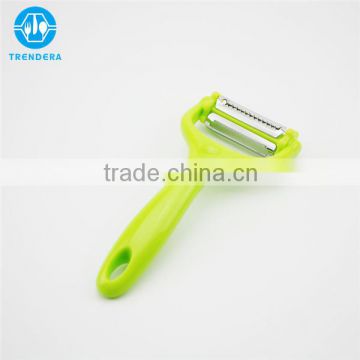 Rotary multifuntional vegetable peeler and shredder