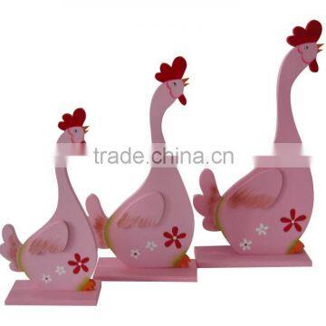 Easter Wooden pink chooks in three sizes decoration on topdesk for home decorative