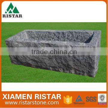Square gray granite stone flower pot in garden RST-DD012