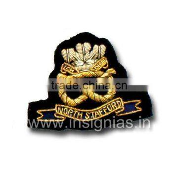 Embroidered bullion wire badges