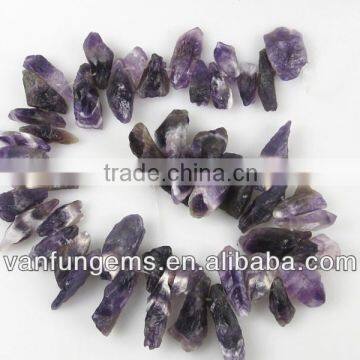 Natural Dog-teeth amethyst bead