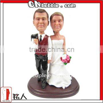 bride and groom wedding cake toppers