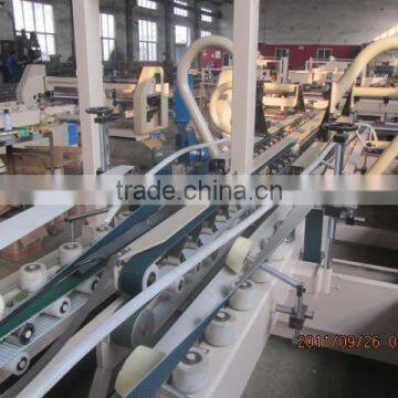 Packing machine automatic corrugated carton folding gluing machine