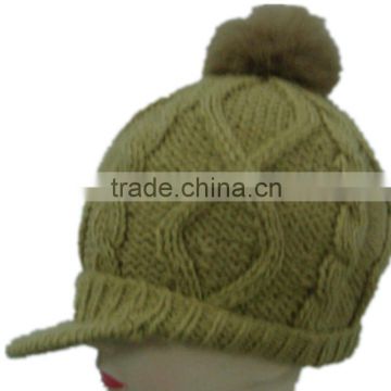 plain dyed, simple hand knitted hat with pom pom & peak