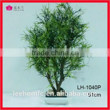 artificial decorative tree in ceramic pot