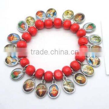 Handmade bracelet chain with red timber beads and two-sided tag