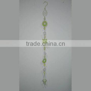 Hanging tealight holder with sun