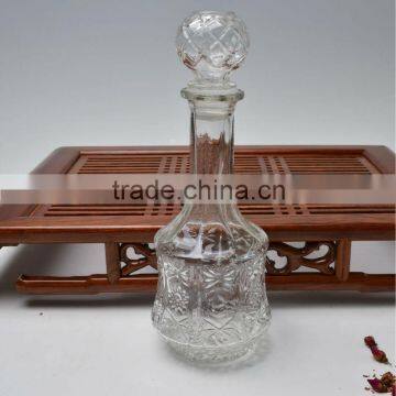 Fancy flower engraved clear glass wine bottle