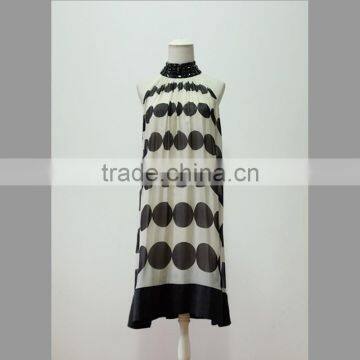 Elegant silk sleeveless dress with collar/dots print