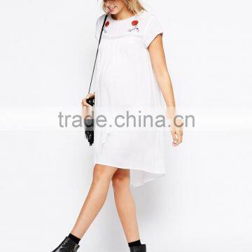 Maternity Embroidered Swing Dress With Dipped Hem China Supplier photo-4