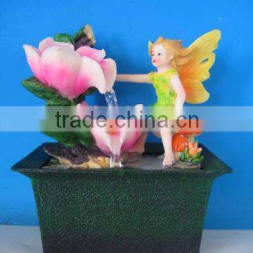 Polyresin baby fairy with battery operated fountain