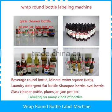 Best Manual round bottle label equipment wine beverage paste paper sticker labeling machine packing machine in high efficiency