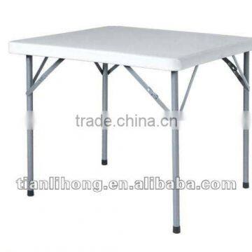 Blow molded folding outdoor plastic table