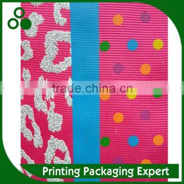 GLITERED COLOR AND PATTERNS ON GROSGRAIN RIBBON