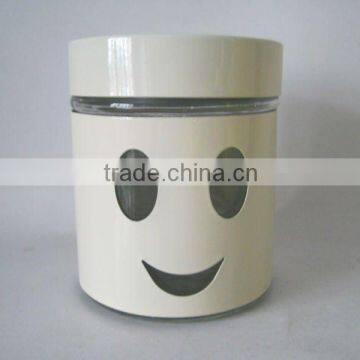 glass jar with smiling face