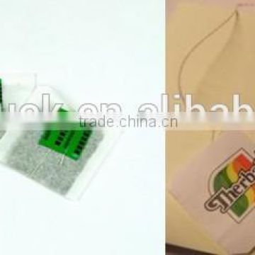 Tea bag packing machine with string and tag