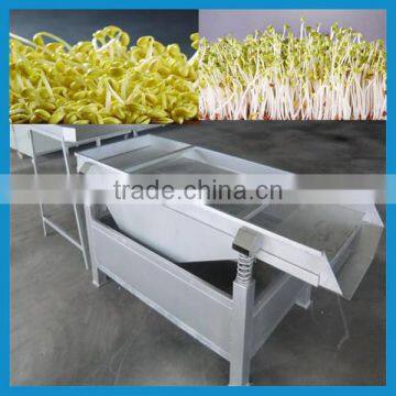 Double vibration mung bean peeling machine