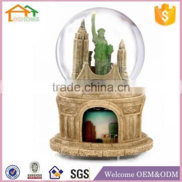 Factory Custom made best home decoration snow globe gift polyresin rotating snow globes