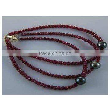 4mm facet Ruby necklace with black tahiti pearls