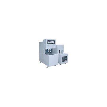 Bottle blowing machine