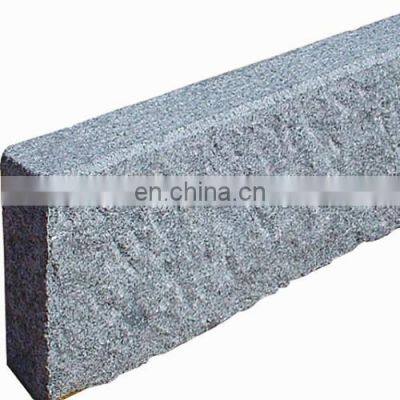 Bush hammered grey granite curbstone