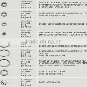 High-pressure common rail injector oil adjustment shims