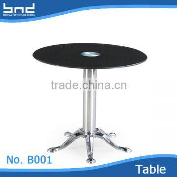 Round dining table with glass top