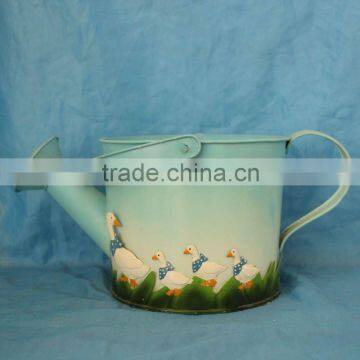 metal watering can