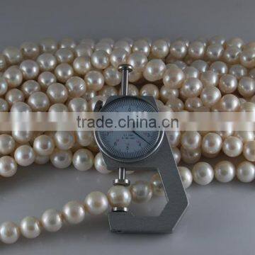 3-4mm AA White Round Freshwater Pearl Strand photo-2