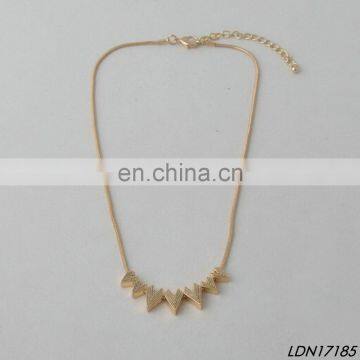 Matt gold chevron charms cluster necklace