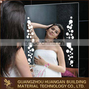 Illuminated bathroom demister mirror