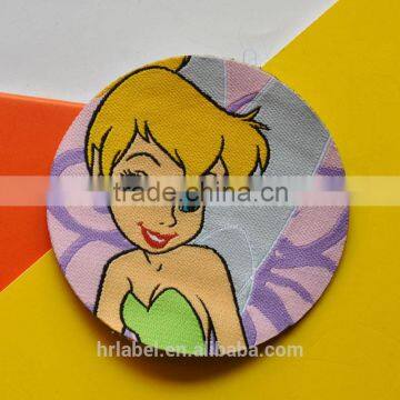 Carton laser cut woven patches
