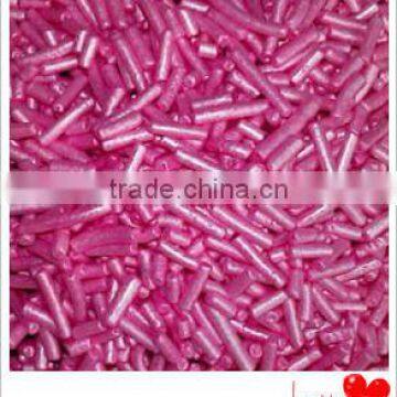 Edible pink pearlized jimmies sprinkles