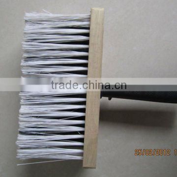 Wall brush with plastic handle