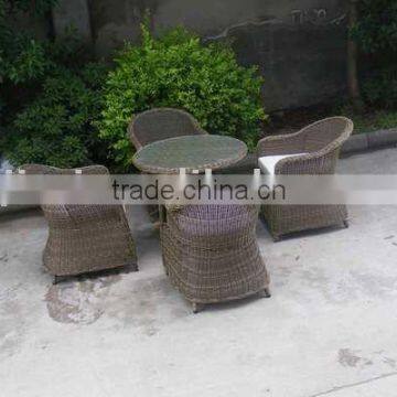 Round rattan outdoor table