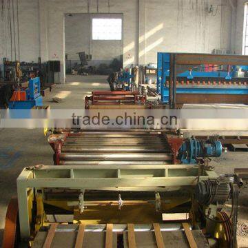 Flat sheet leveling and cutting machine