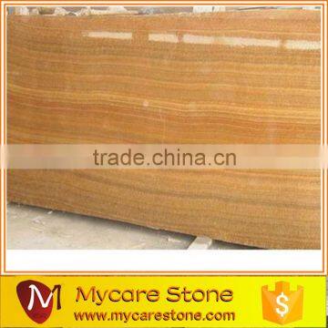 Beautiful yellow wooden grain marble floor and wall tile