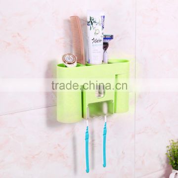 Toothbrush holder and toothpaste dispenser