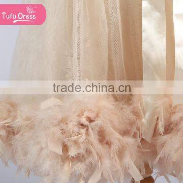 The Ivory Color Girls Boutique Dress With Fluffy Feather