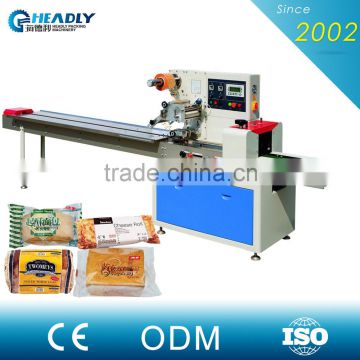 Horizontal dual frequency food cookies packaging machine