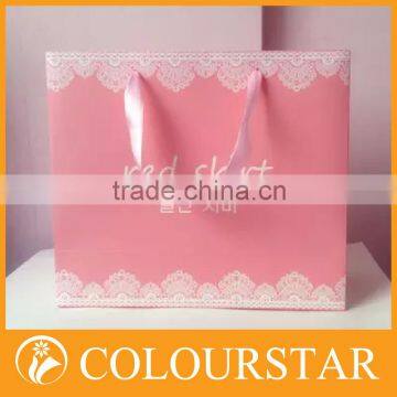 Small paper bag with ribbon handle