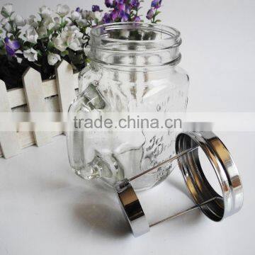Decorated Candle in Clear Glass Jar photo-3